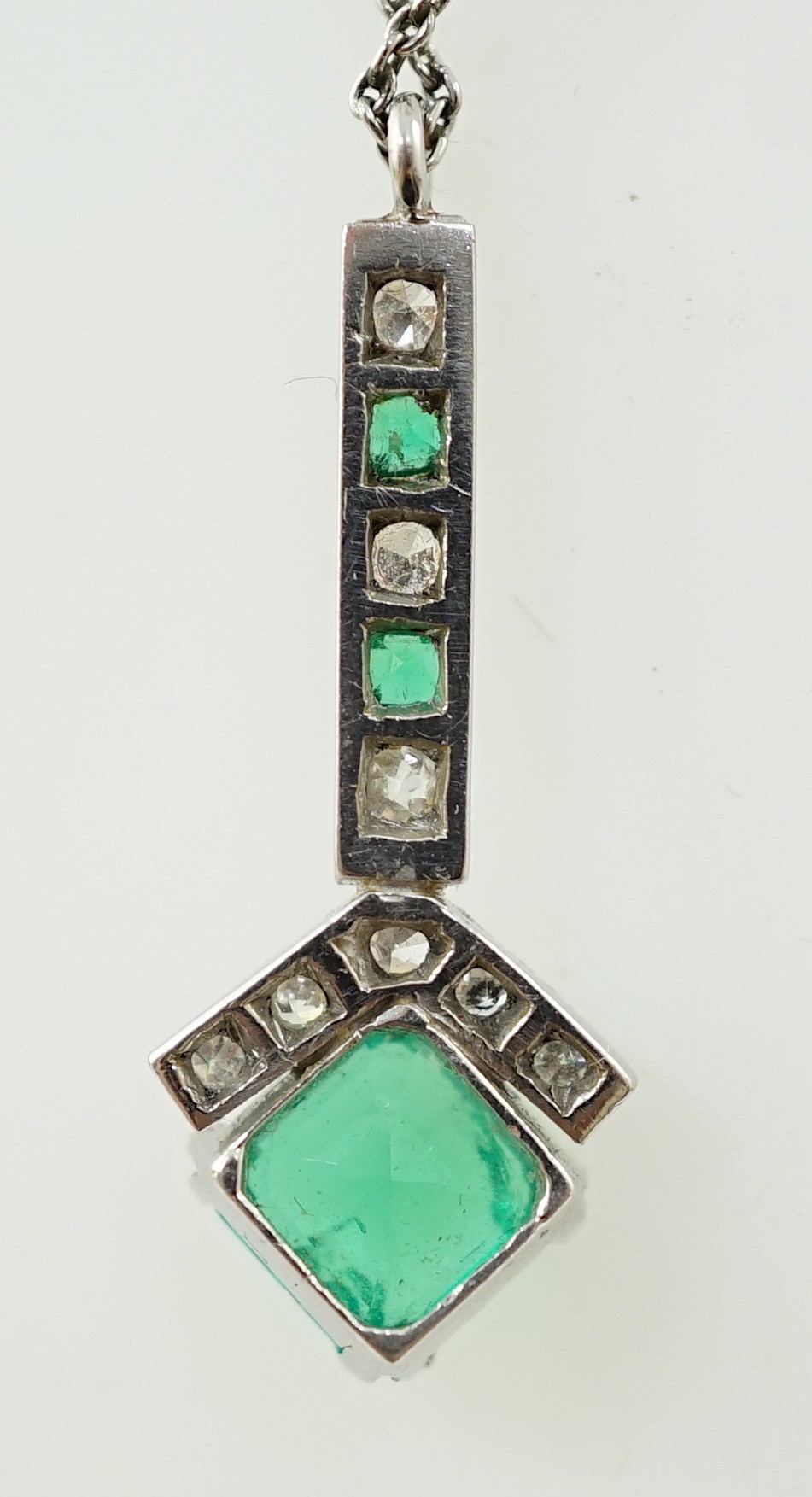 A 1920's platinum?, emerald and diamond set pendant necklace